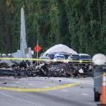 Wreckage is strewn across Route 21 where an Air National Guard C-130 cargo plane crashed. 