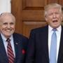 FILE - In this Nov. 20, 2016, file photo, then-President-elect Donald Trump calls out to media as he and former New York Mayor Rudy Giuliani pose for photographs as Giuliani arrives at the Trump National Golf Club Bedminster clubhouse in Bedminster, N.J.. Giuliani may have added to the legal headaches of his new client and old friend, President Donald Trump, when he drew a link on May 3,, 2018, between the $130,000 payment to a porn star to keep her quiet about an alleged affair and the potential fallout if her story had gone public shortly before the 2016 election. (AP Photo/Carolyn Kaster, File)