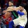 Philadelphia, PA: 5-7-18:The Celtics Jayson Tatum and the 76ers Ben Simmons battle for the ball first half action. The Boston Celtics visited the Philadelphia 76ers for Game Four of their NBA Eastern Conference Semi Final Playoff series at the Wells Fargo Center. (Jim Davis/Globe Staff)