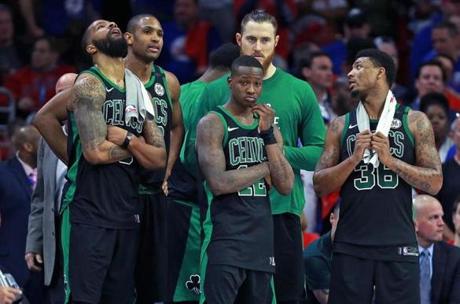 Philadelphia, PA: 5-7-18: As the final seconds ticked off the clock, the Celtics (left to right) Marcus Morris, Al Horford, Terry Rozier III, Aron Baynes and Marcus Smart are pictured. The Boston Celtics visited the Philadelphia 76ers for Game Four of their NBA Eastern Conference Semi Final Playoff series at the Wells Fargo Center. (Jim Davis/Globe Staff)

