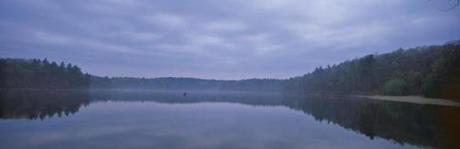 A lone fisherman at Walden Pond
