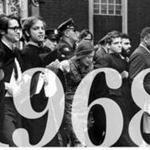 At Harvard?s 1968 commencement, police removed demonstrators from Harvard Yard. The group was protesting the choice of the Shah of Iran as commencement speaker. Third from right is Donald King. 