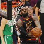 CLEVELAND, OH - MAY 19: LeBron James #23 of the Cleveland Cavaliers dunks the ball in the first half against the Boston Celtics during Game Three of the 2018 NBA Eastern Conference Finals at Quicken Loans Arena on May 19, 2018 in Cleveland, Ohio. NOTE TO USER: User expressly acknowledges and agrees that, by downloading and or using this photograph, User is consenting to the terms and conditions of the Getty Images License Agreement. (Photo by Gregory Shamus/Getty Images)
