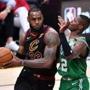 CLEVELAND, OH - MAY 21: LeBron James #23 of the Cleveland Cavaliers looks to pass against Terry Rozier #12 of the Boston Celtics in the third quarter during Game Four of the 2018 NBA Eastern Conference Finals at Quicken Loans Arena on May 21, 2018 in Cleveland, Ohio. NOTE TO USER: User expressly acknowledges and agrees that, by downloading and or using this photograph, User is consenting to the terms and conditions of the Getty Images License Agreement. (Photo by Jamie Sabau/Getty Images)