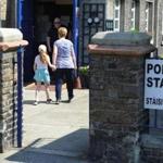 A woman and a child entered a polling station in Dublin. 