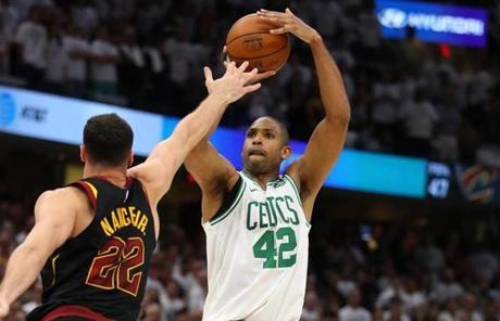 CLEVELAND, OH - MAY 25: Al Horford #42 of the Boston Celtics shoots against Larry Nance Jr. #22 of the Cleveland Cavaliers in the fourth quarter during Game Six of the 2018 NBA Eastern Conference Finals at Quicken Loans Arena on May 25, 2018 in Cleveland, Ohio. NOTE TO USER: User expressly acknowledges and agrees that, by downloading and or using this photograph, User is consenting to the terms and conditions of the Getty Images License Agreement. (Photo by Gregory Shamus/Getty Images)
