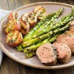 Grilled Spice-Rubbed Pork Tenderloin With Grilled Mustard Potatoes and Simple Grilled Asparagus.