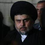 Iraqi Shiite cleric Moqtada al-Sadr looks on during a meeting to discuss economic and security issues held at Iraqi Shiite Muslim leader Ammar al-Hakim's house in the southern Shiite city of Najaf on January 23, 2015. Al-Sadr expressed his hopes for a unity government and encouraged the efforts of Iraqi Prime Minister Haider al-Abadi in avoiding previously made mistakes. AFP PHOTO/ HAIDAR HAMDANI (Photo credit should read HAIDAR HAMDANI/AFP/Getty Images)