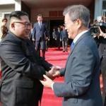 TOPSHOT - This photograph taken on May 26, 2018 and released by North Korea's official Korean Central News Agency (KCNA) on May 27 shows South Korea's President Moon Jae-in (R) shaking hands with North Korea's leader Kim Jong Un after their second summit at the north side of the truce village of Panmunjom in the Demilitarized Zone (DMZ). Kim Jong Un believes a summit with US President Donald Trump will be a landmark opportunity to end decades of confrontation, South Korea's President Moon Jae-in said May 27 following his surprise meeting with the North Korean leader. / AFP PHOTO / KCNA VIA KNS / - / - South Korea OUT / REPUBLIC OF KOREA OUT ---EDITORS NOTE--- RESTRICTED TO EDITORIAL USE - MANDATORY CREDIT 