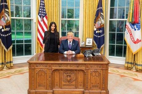 President Trump tweeted a picture of himself and Kim Kardashian West in the Oval Office on Wednesday.
