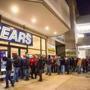 As midnight approached on Black Friday in 2012, a line of customers formed at the Sears at the South Shore Plaza in Braintree. 