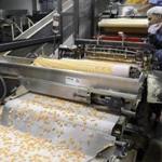 Sweethearts candies drop onto a conveyor belt at the Necco plant in Revere.