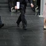 Business men and women walk in the City of London on April 4, 2018. Employers with more than 250 staff have until midnight on Wednesday to publish the gender pay gap within their companies. Britain's Prime Minister Theresa May is eager to see a change in the gender gap, or percentage difference between the average male salary and the average female salary -- in an eventual push toward pay equality, meaning the same money for a comparable job. / AFP PHOTO / Daniel LEAL-OLIVASDANIEL LEAL-OLIVAS/AFP/Getty Images