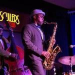 Saxophonist JD Allen performs at Scullers Jazz Club with bassist Noah Jackson and drummer Rudy Royston.