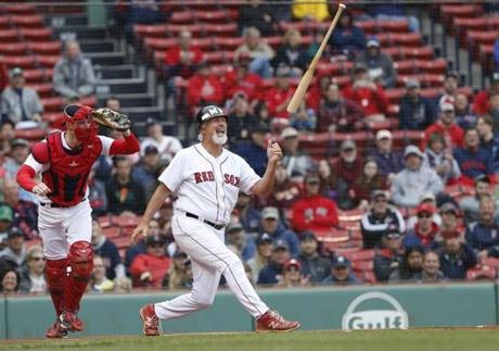 Bill Lee flips his bat after striking out during the the Red Sox alumni game.
