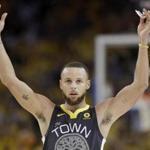 Golden State Warriors guard Stephen Curry (30) celebrates during the second half of Game 2 of basketball's NBA Finals between the Warriors and the Cleveland Cavaliers in Oakland, Calif., Sunday, June 3, 2018. The Warriors won 122-103. (AP Photo/Marcio Jose Sanchez)