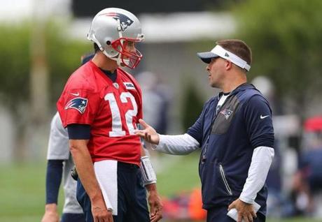 Foxborough- 06/05/18- QB Tom Brady has a talk with Josh McDaniels during a passing drill. The Patriots held a minicamp at the Gillette Stadium practice facility. Photo by John Tlumacki/Globe Staff(sports)
