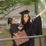 Briana Williams on graduation day with her daughter, Evelyn.