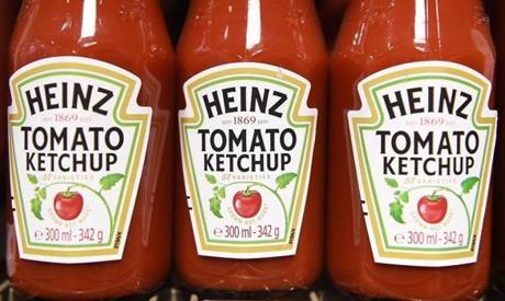 epa04678164 Heinz tomato ketchup at a store in central London, Britain, 25 March 2015. Media reports state that Kraft Foods has agreed to merge with Heinz. EPA/ANDY RAIN
