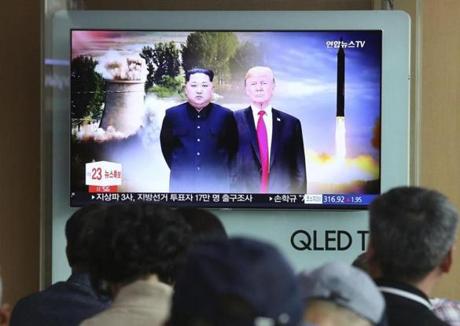 A television inside a Seoul railroad station showed a newscast on Monday discussing the summit between President Trump and Kim Jong Il.
