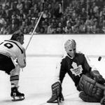 Boston, MA - 4/5/1972: Boston Bruins John McKenzie, left, scores on Toronto Maple Leafs Jacques Plante, right, during a game at the Boston Garden, April 5, 1972. (Dan Goshtigian/Globe Staff) --- BGPA Reference: 180403_ON_007