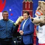 Mandatory Credit: Photo by YURI KOCHETKOV/EPA-EFE/REX/Shutterstock (9709166e) Marcel Desailly FIFA Fan Fest opening ceremony, Moscow, Russian Federation - 10 Jun 2018 FIFA Fan Fest Ambassador, former French soccer player Marcel Desailly (L), holds the FIFA World Cup trophy during the official opening ceremony of the FIFA Fan Fest in Moscow, Russia, 10 June 2018. The FIFA World Cup 2018 will take place in Russia from 14 June until 15 July 2018.