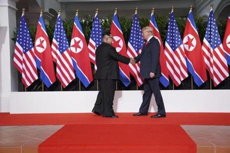 President Donald Trump and Kim Jong Un of North Korea greeted each other before their meeting. 
