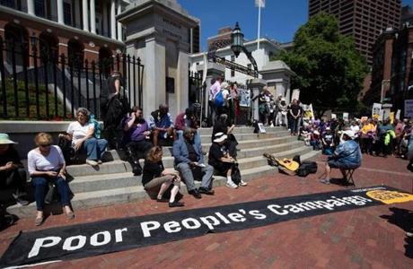 Poor People?s Campaign protesters gathered the stairs outside the Massachusetts State House on Monday. 
