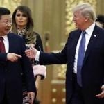 President Donald Trump (right) with China?s President Xi Jinping arrived for a state dinner in November, 2017. 