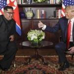U.S. President Donald Trump gives North Korean leader Kim Jong Un a thumbs up during their meeting at a resort on Sentosa Island in Singapore on Tuesday, June 12, 2018. (AP Photo/Evan Vucci)