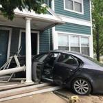 Officials said a driver crashed into a two-story Roxbury residence Friday afternoon. 