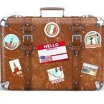 Old suitcase beggage with travel stickers isolated on white background. 3d illustration
