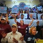 Boston, MA - 05/08/18 - Hundreds rallied inside the State House for paid leave and a $15 minimum wage. The Raise Up Massachusetts coalition rally featured speakers and a march inside the building that passed by Speaker DeLeo's office. (Lane Turner/Globe Staff) Reporter: (in caps) Topic: (09rally)