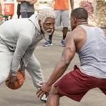 This image released by Summit Entertainment shows Boston Celtics basketball player Kyrie Irving, left, portraying Uncle Drew in a scene from the comedy 