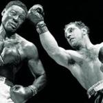 Marciano in a 1954 heavyweight bout with Ezzard Charles. 