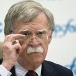 FILE - In this June 27, 2018, file photo, U.S. National security adviser John Bolton listens to question as speaks to the media after his talks with Russian President Vladimir Putin in Moscow, Russia. Bolton said Sunday, July 1, the U.S. has a plan that would lead to the dismantling of North Korea's nuclear weapons and ballistic missile programs in a year. (AP Photo/Alexander Zemlianichenko, File)
