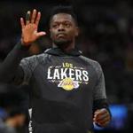 Los Angeles Lakers forward Julius Randle (30) in the first half of an NBA basketball game Friday, March 9, 2018, in Denver. (AP Photo/David Zalubowski)