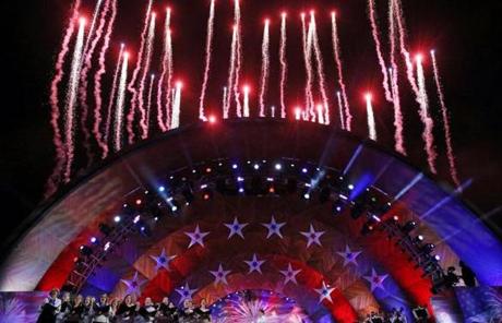Pyrotechnics are fired from the Hatch Shell during the Boston Pops Fireworks Spectacular at the Hatch Shell on the Esplanade.
