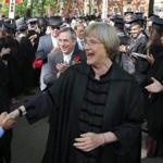 Then-Harvard University president Drew Faust greeted students before the school?s commencement ceremonies in May. 