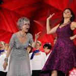 Rita Moreno (left) and Natalie Cortez perform during the Boston Pops Fireworks Spectacular at the Hatch Shell.