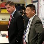 01/18/2018 Boston Ma - Boston Mayor Marty Walsh (cq) left and BPS Superintendent Tommy Chang (cq) right was at the Mario UMana Academy in East Boston for the announcement of a Federal grant to expand the BoStem program. .Jonathan Wiggs /Globe Staff Reporter:Topic.