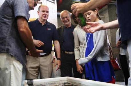 WOODS HOLE, MA - 07/09/2018 Prince Albert II of Monaco, 2nd from left, visits the Marine Biological Laboratory (MBL) in Woods Hole. Influenced by his grandfather Prince Albert I, who was an avid oceanographer, the Prince made a donation to the laboratory from the Prince Albert II of Monaco Foundation. Erin Clark for the Boston Globe
