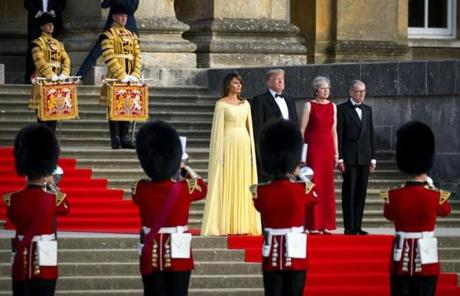 President Donald Trump, second from left, and first lady Melania Trump, left, are welcomed by British Prime Minister Theresa May and her husband, Philip May, to a gala dinner at Blenheim Palace near Oxford on Thursday, July 12, 2018. Trump is on a seven-day, three-nation European trip ? to Belgium, Britain and then Finland for talks with President Vladimir Putin of Russia ? that highlights the ways he has utterly transformed U.S. foreign policy. ()
