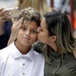 In this July 5, 2018 file photo, Sirley Silveira Paixao, an immigrant from Brazil seeking asylum, kissed her 10-years-old son Diego Magalhaes, after Diego was released from immigration detention in Chicago.