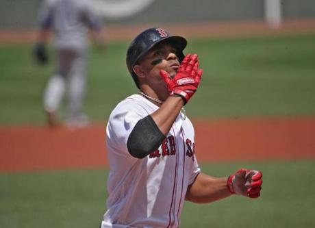 Boston MA 7/15/18 Boston Red Sox Xander Bogaerts blows a kiss after touching home plate on a solo home run against the Toronto Blue Jays during first inning action at Fenway Park. (photo by Matthew J. Lee/Globe staff) topic: reporter: 
