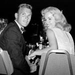 Tab Hunter at a Los Angeles dinner reception with actress Tuesday Weld in 1959.