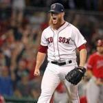 Boston, MA: 6-27-18: Both the crowd and Red Sox reliever Craig Kimbrel erupt after he got a strile out to end the top of the eighth inning,leaving the bases loaded. The Boston Red Sox hosted the Los Angeles Angels for a regular season MLB baseball game at Fenway Park (Jim Davis/Globe Staff)
