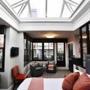 The penthouse suite at No. 284 has an atrium glass roof and private terrace. 