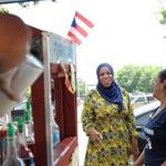 Tahirah Amatul-Wadud greeted voters on Main Street in Holyoke on July 3. A lawyer and mother of seven from Springfield, she 

lags far behind Representative Richard Neal in name recognition in the First Congressional District, a patchwork quilt of cities, suburbs, and hill towns that is 86 percent white and has never elected a woman to Congress.
