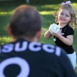 Lynn, MA: 7-12-18: Adrianna MacCormack, whose mother Vanessa Masucci MacCormack was murdered last September, will be throwing out the first pitch at a memorial softball tournament. She is pictured practicing with her uncle, Vanessa's brother Joe Masucci. (Jim Davis/Globe Staff) 